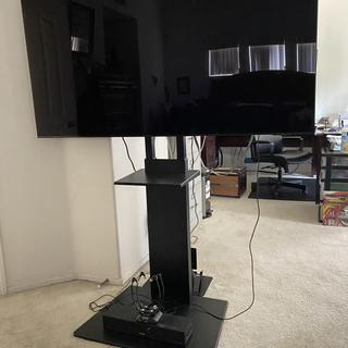 Front of stand with TV mounted.