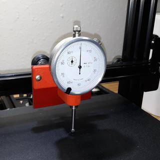 Easy manual bed leveling with dial indicator and magnetic base