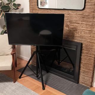 Tripod stand with a 43" TV.