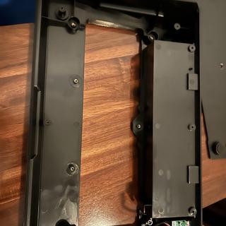 Bottom of enclosure with passthrough daughter board