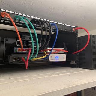 Red cables denote back-haul to ISP. Painted the coax cable red song with the keystone.