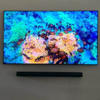 Wall mount sound bar and TV