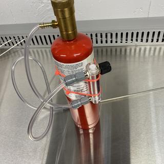 Tie-wrapped to a Berzomatic oxygen cylinder
