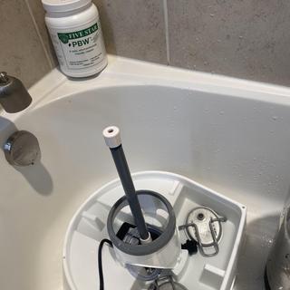 Rounded end fits the tub. Soak parts in the reservoir while you run it.
