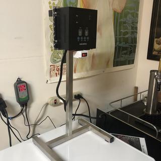 The Inkbird IPB-16S PID controller mounted to an aluminum bracket, bolted to the modified stand.