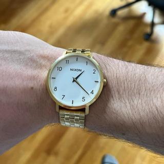 Nixon arrow shop gold